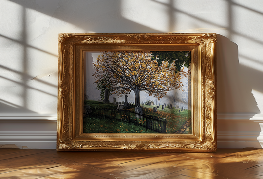 Lakeview Cemetery art print displayed in a decorative gold frame, leaned against a neutral wall with natural lighting.