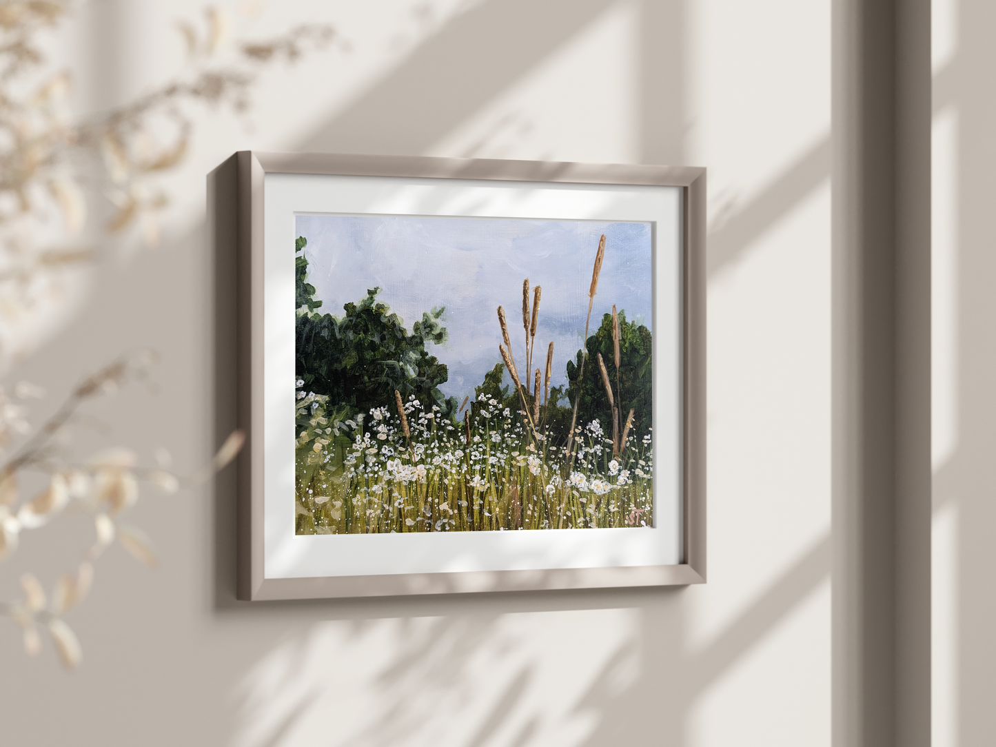 Mainecore art print, framed and hung on a neutral wall with natural lighting. 