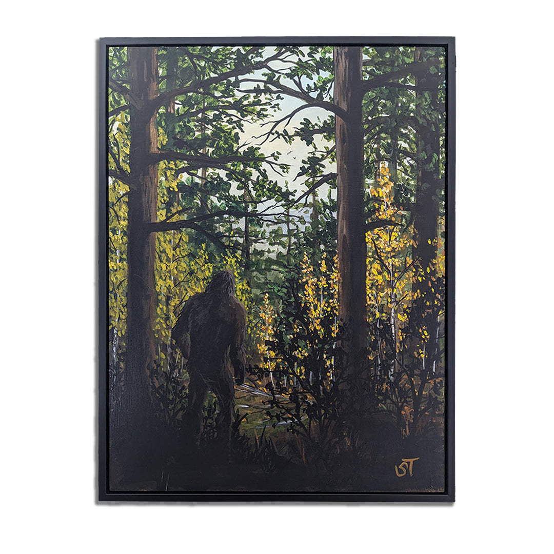 Original acrylic painting on wood panel featuring a cryptic figure of Sasquatch amidst a forest background, framed in black.