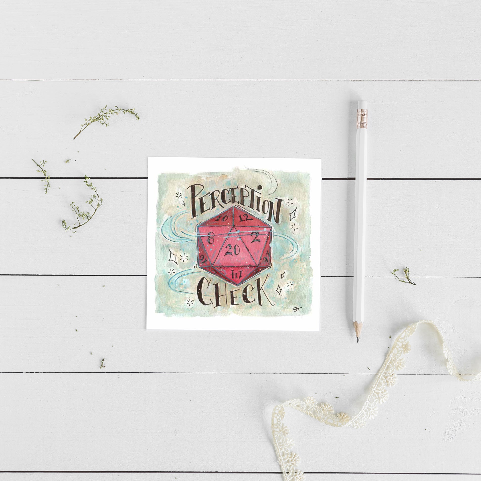 Card with a pink D20 and text on a white wooden surface with a pencil and decorative elements.